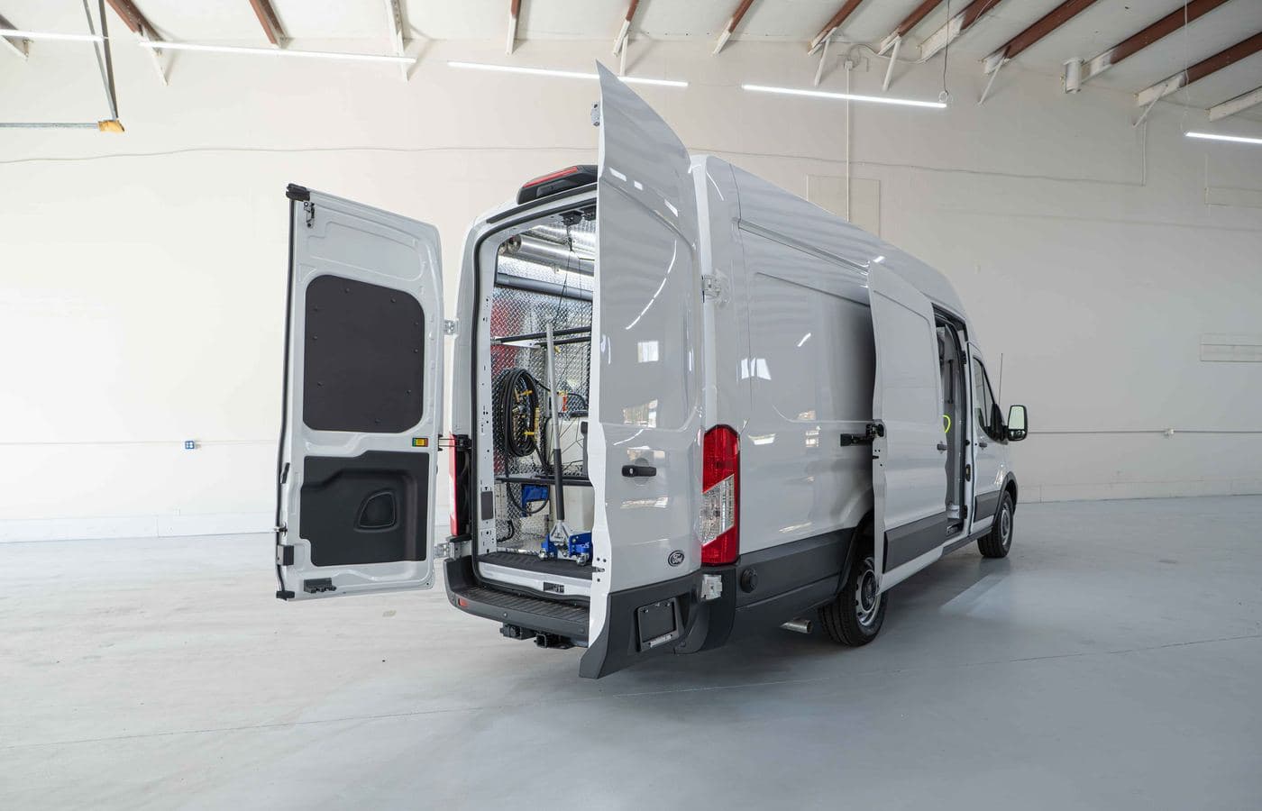 Side door open showing the fitted-out equipment bay